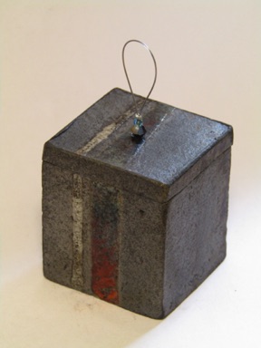 Lidded box with raku glaze