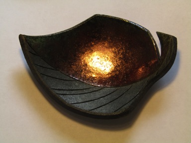 Copper glazed raku leaf
